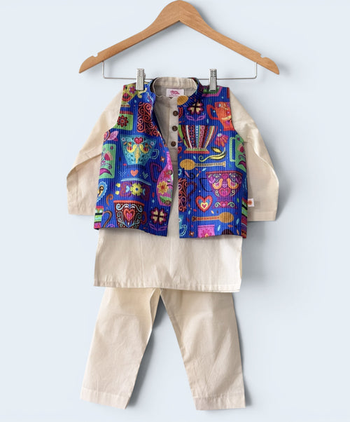 Boys 3-piece ethnic wear set featuring an off-white cotton kurta and pajama with a vibrant, multi-colored printed bandi jacket.